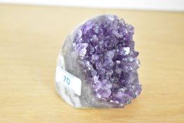 A 20th-century Amethyst geode, featuring a deep purple quartz, 8.5cm in height.