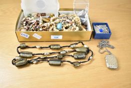 An assortment of costume jewellery, including glass pieces, beaded jewellery, faux pearls and a