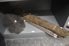 A late 19th to early 20th-century chimney sweep brush kit, to include 2 poles, one large, round