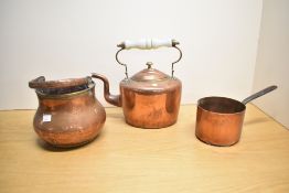 A selection of late 19th to early 20th century copperware, to include a handled teapot, a confit pot