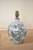 A 20th century studio pottery lamp base, of baluster form featuring a blue and green mottled