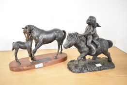 A late-20th century Beswick model of 'Black Beauty & Foal', having an oval wooden base, sold