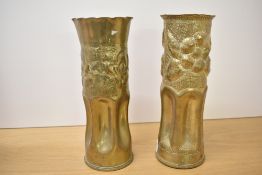Two early 20th-century World War II (1940) brass trench art vases, made from a Mark 2 case for a