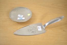 A 20th-century Keswick School of Industrial Arts (KSIA) Arts and Crafts white metal cake slice,