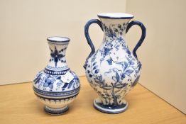 Two 20th-century presumed German Meissen-style blue and white porcelain vases, featuring floral