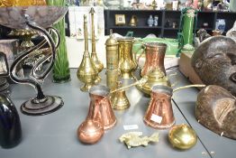 A quantity of 19th to 20th century copper and brass ware, to include three brass rosewater