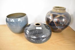 Three late 20th-century British studio pottery vases, having been glazed in various styles including