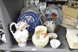 A pair of Masons ironstone transfer printed peacock pattern plates, 25cm sold together with a