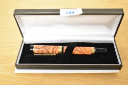 A boxed Sigma converter fill fountain pen in Orange Swirl having Iridium Point Germany nib