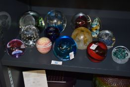 A large quantity of 20th-century to modern studio art glass paperweights, including Caithness ‘