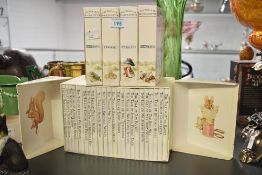 A quantity of 20th-century F.Warne and Company Beatrix Potter 'The World of Peter Rabbit'