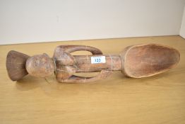 A 20th-century African Art presumed Congolese Mangbetu Carved Wood Figural Spoon, featuring a female