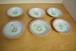 Six early 20th-century Adams Calyx Ware 'Lowestoft' bowls, featuring a delicate floral design,