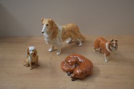 Two Beswick Pottery animal studies comprising Fox- Curled model number 1017 designed by Arthur