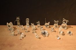 A group of twenty one Swarovski Crystal animal studies to include squirrel, turtle pig, and