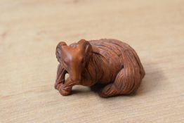 A small Japanese carved boxwood Netsuke Ram study, no visible markings or signature, measures 4cm