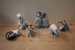 A Royal Copenhagen porcelain animal group 'Penguins' model number 325 sold together with a group
