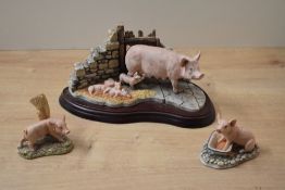 A Border Fine Arts pig group 'Last to Finish' model number B0011 designed by Kirsty Riley sold