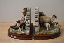 A pair of Border Fine Arts figure groups modelled as book ends, '10 O'Clock Break' model number