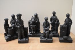 A group of six heavy black resin figures comprising 'Avicenna', 'The Instructor', 'The