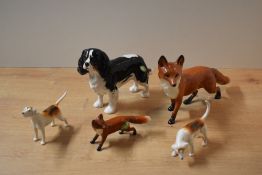 A group of five Beswick Pottery animal studies comprising Fox (Standing) model number 1016A designed