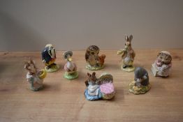 A group of eight Beswick Pottery and Royal Albert bone china Beatrix Potter characters to include '