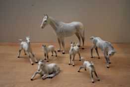 A group of seven Beswick Pottery horse and foal studies to include 'Huntsman's Horse' model number