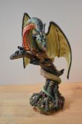 A large resin Land of the Dragon's 'Woodland Dragon' figure, model number KO15, measures 29cm