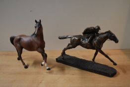 A Royal Doulton bone china horse study in matt brown finish sold alongside a resin figure group