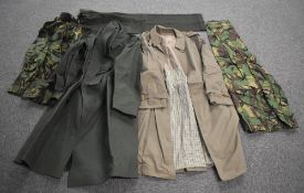 British Army Greatcoats, one olive green size 14 Men's Mackintosh with blue wool lining in 'as