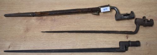 Socket bayonets, one Brown Bess-type with triangular section fullered spike steel 43cm blade, this