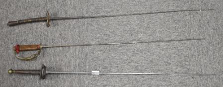 Vintage French rapiers, one with metal D guard, remnants of red cloth to wired handle, no makers