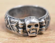 German SS Ehrenring-style Honour ring, made of white metal with Totenkopf skull to the centre and