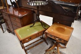 A small reproduction mahogany pedestal Pembroke table, with rounded leaves, two drawers and four
