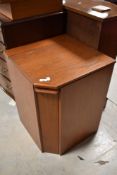 A vintage teak corner storage unit, having lift lid, approx. 49 x 49cm