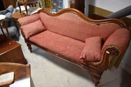 A Victorian mahogany chaise longue