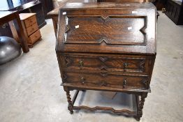 An early 20th Century oak bureau (badly wormed)