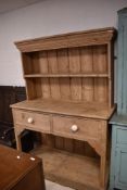 A Victorian pine kitchen dresser , width approx. 129cm