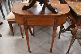 A Victorian mahogany hall table having inlaid decoration and square tapered legs, width approx.