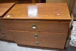 A selection of vintage Meredew Avalon teak style bedroom furniture comprising dressing table, two