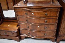 A nice quality reproduction Regency style serpentine front chest of four long drawers, plus brushing