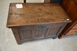 A lovely George III oak coffer of lovely proportions having three linen fold front panels,