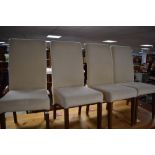 A set of four modern suedette dining chairs