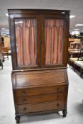 An early to mid 20th Century oak bureau bookcase, width approx. 92cm