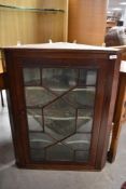 A 19th Century mahogany corner display having astral glazed door, height approx. 86cm