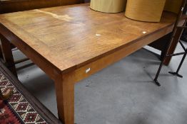A vintage teak dining table of rectangular form on heavy square legs, approx 188 x 92cm