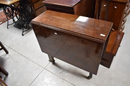 A 19th Century mahogany sutherland style table having square gate legs, width approx. 79cm