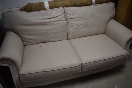 A modern two seater settee in nice clean condition with a neutral colour, width approx. 190cm