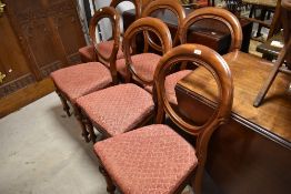 A set of Victorian mahogany balloon back dining chairs, stamped to underside 10706