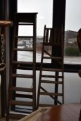 Two sets of vintage wooden stepladders